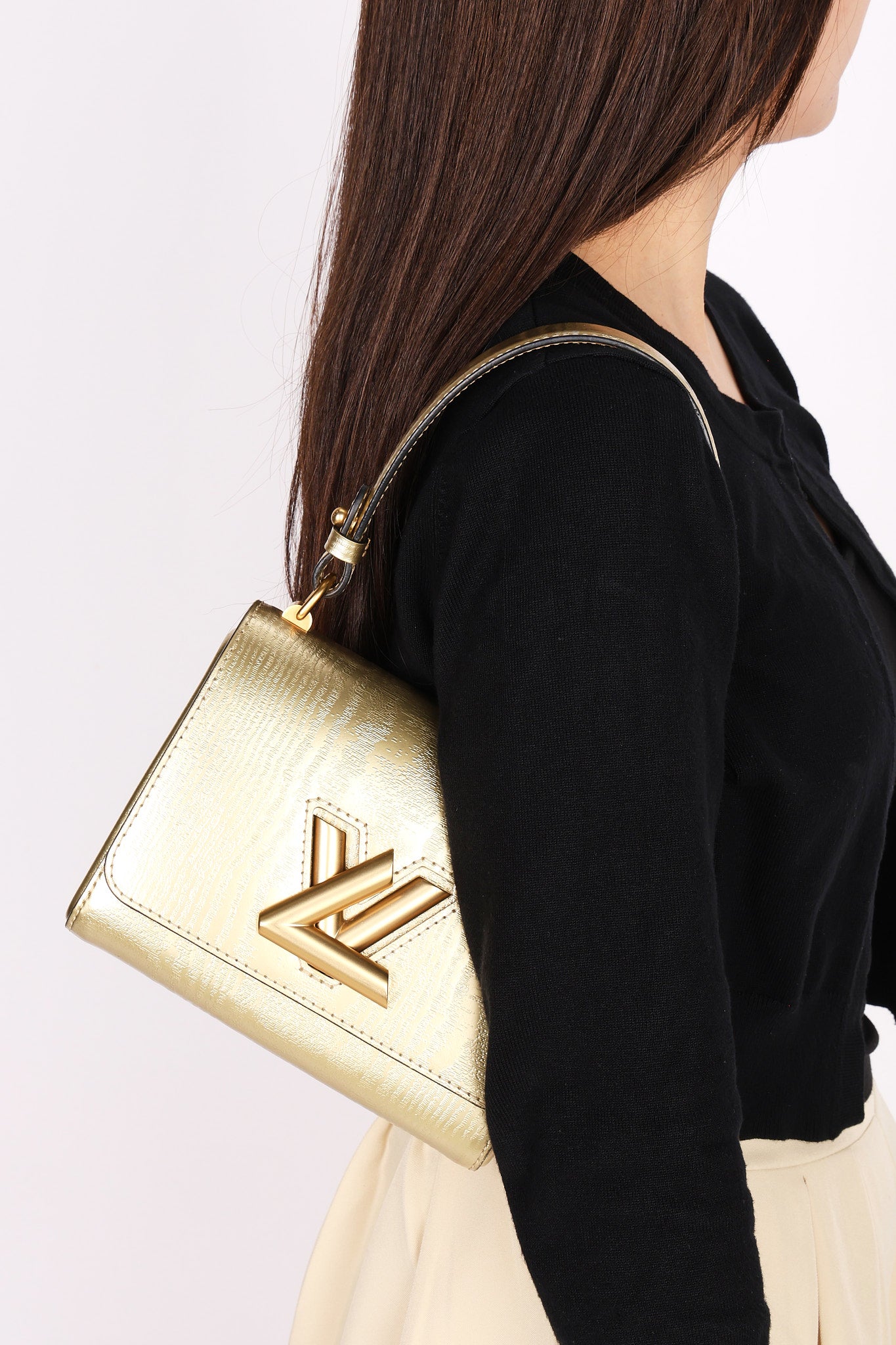 Louis Vuitton Gravity Twist PM Gold 2017