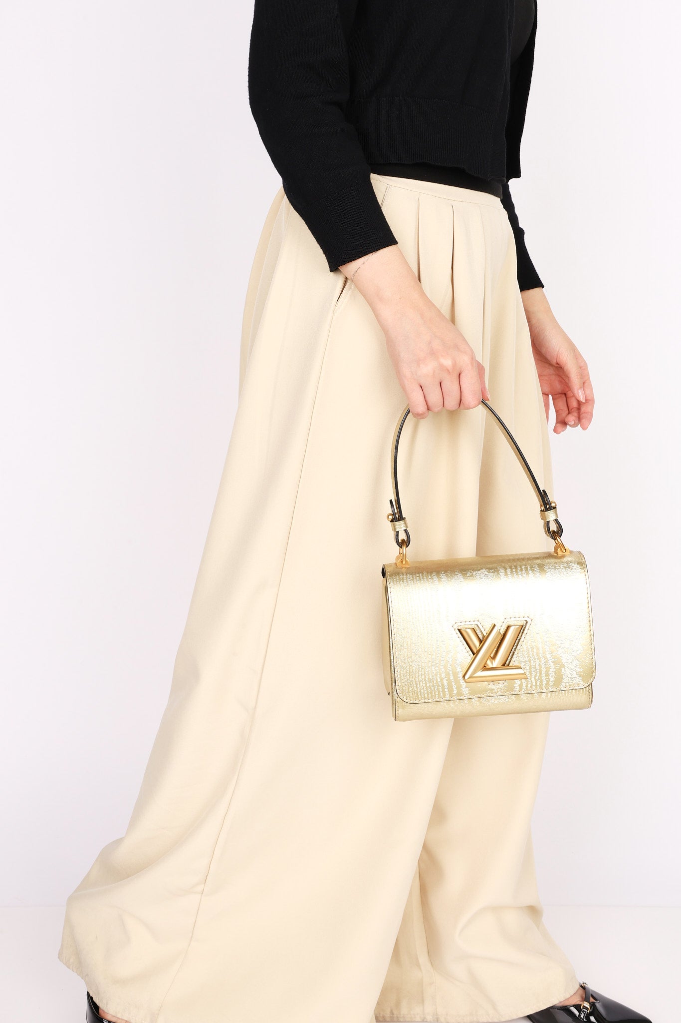 Louis Vuitton Gravity Twist PM Gold 2017