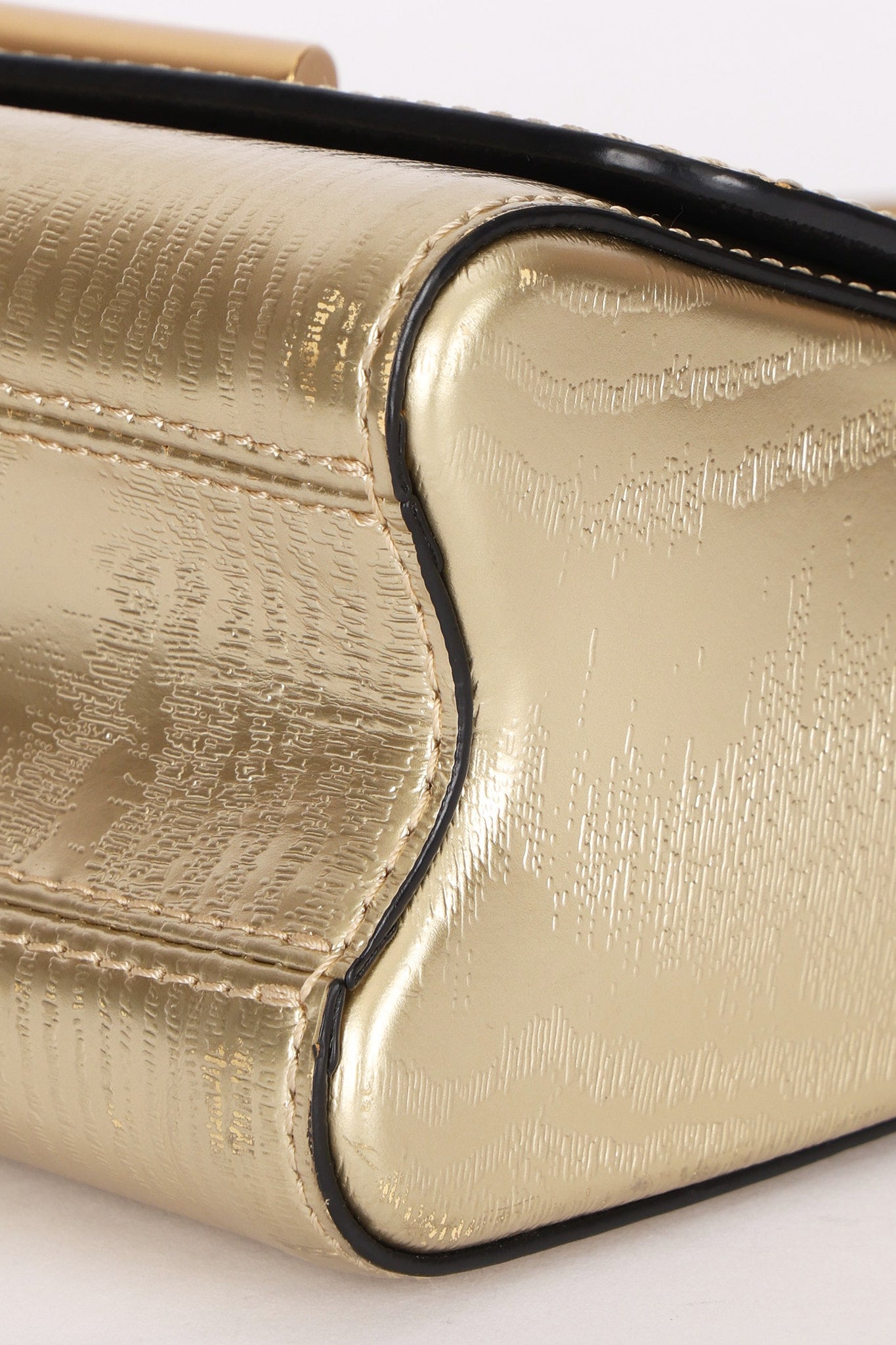 Louis Vuitton Gravity Twist PM Gold