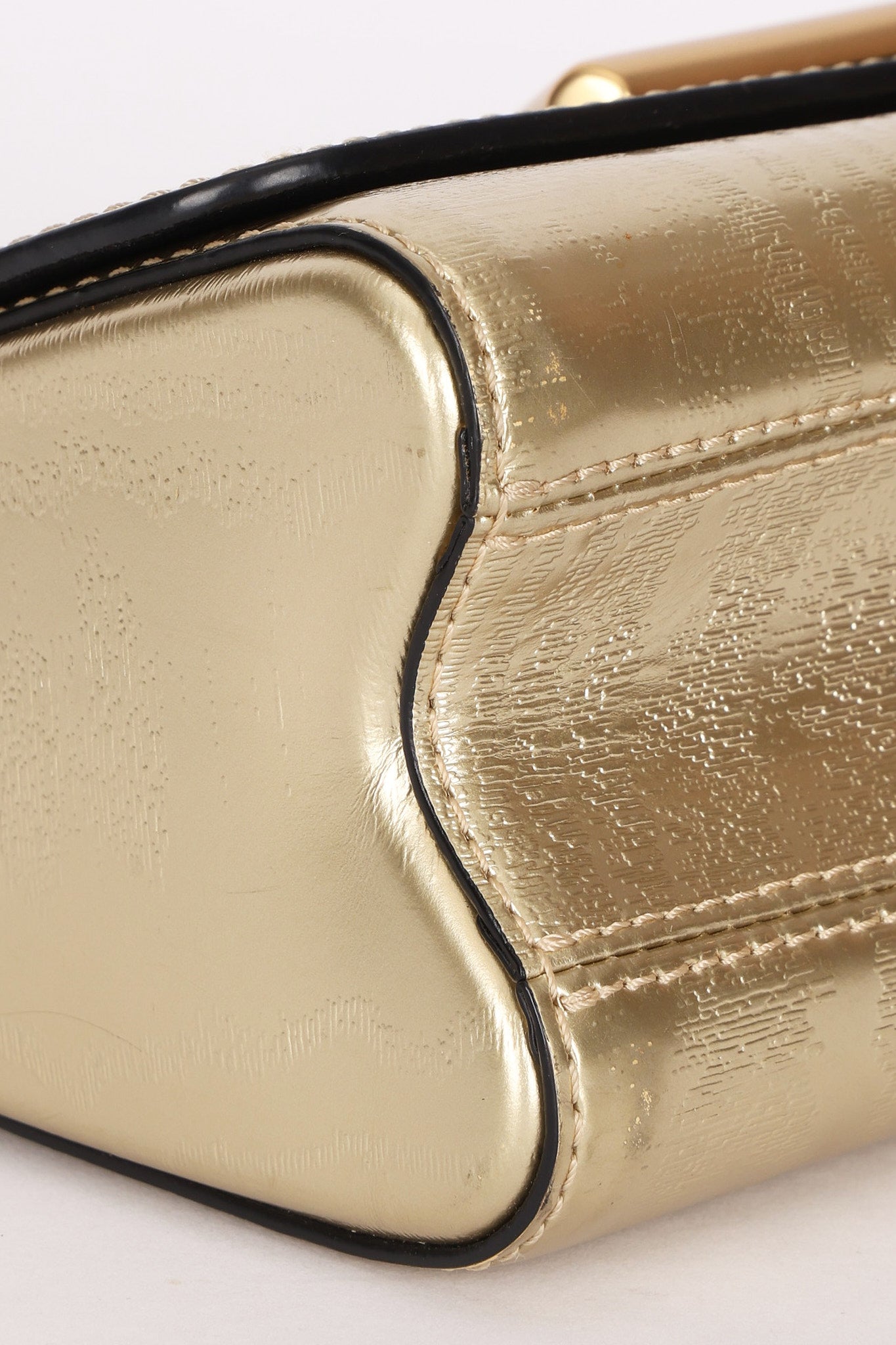 Louis Vuitton Gravity Twist PM Gold