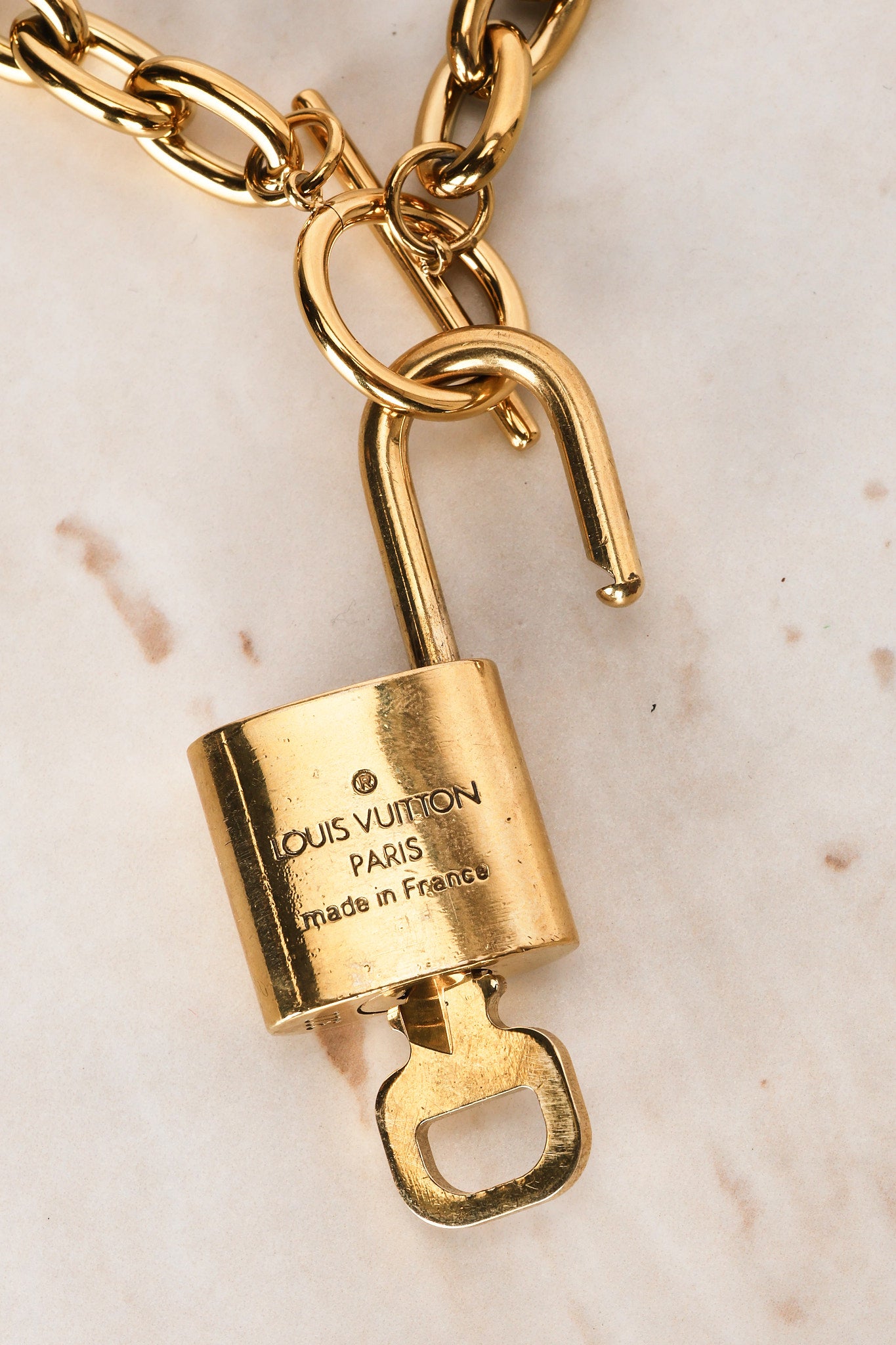 Louis Vuitton Monogram Gold Monogram Lock & Key x 10