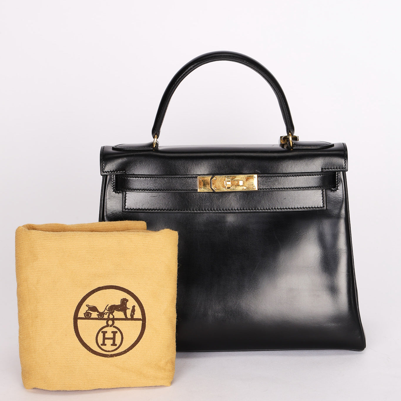 Hermès Kelly 28 Noir Box Retourne 1987 GHW