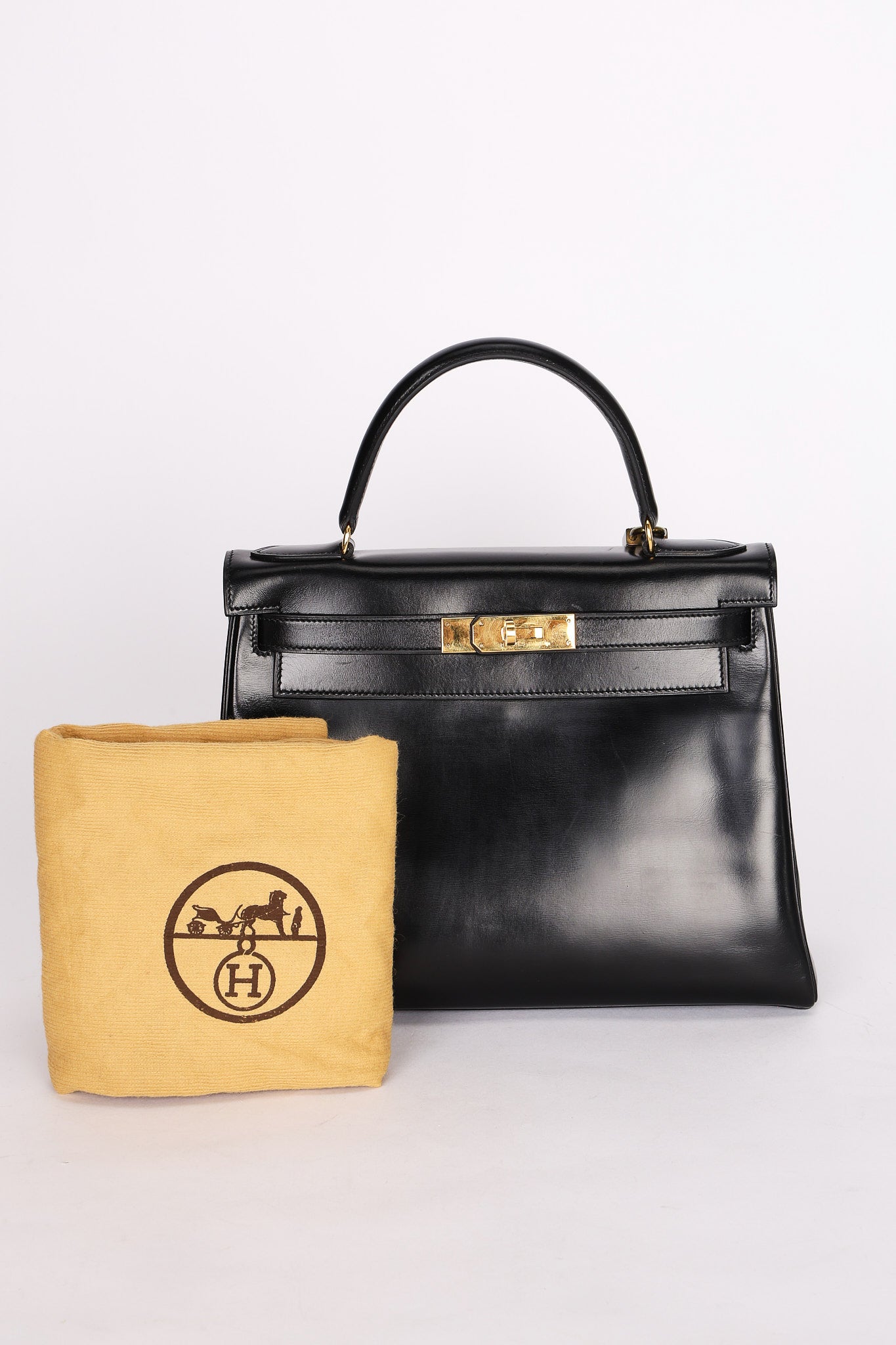 Hermès Kelly 28 Noir Box Retourne 1987 GHW