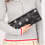 Chanel Star Attitude Grommet Clutch Black Calfskin MMHW