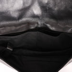Chanel Star Attitude Grommet Clutch Black Calfskin MMHW