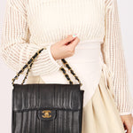 Chanel Vertical Single Flap Black Caviar 24K GP