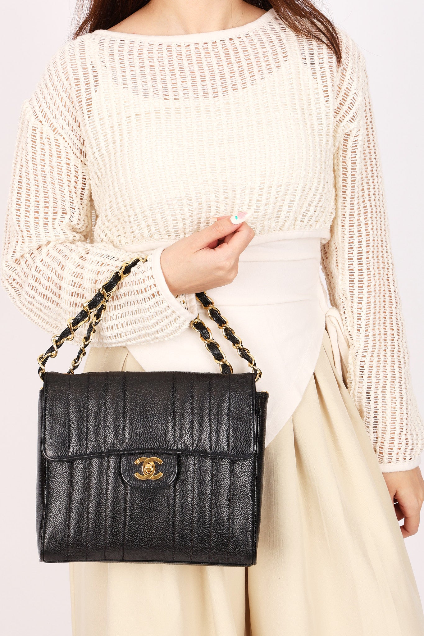 Chanel Vertical Single Flap Black Caviar 24K GP
