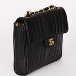Chanel Vertical Single Flap Black Caviar 24K GP