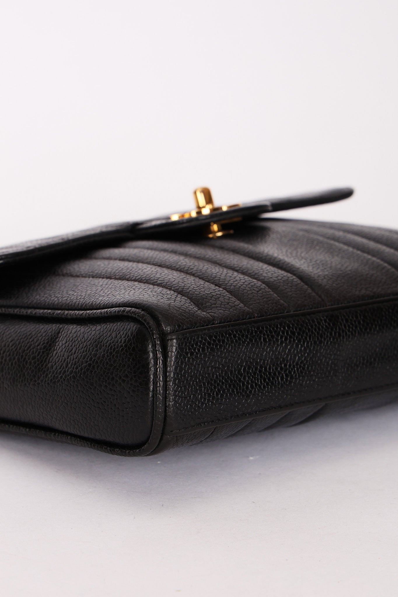 Chanel Vertical Single Flap Black Caviar 24K GP