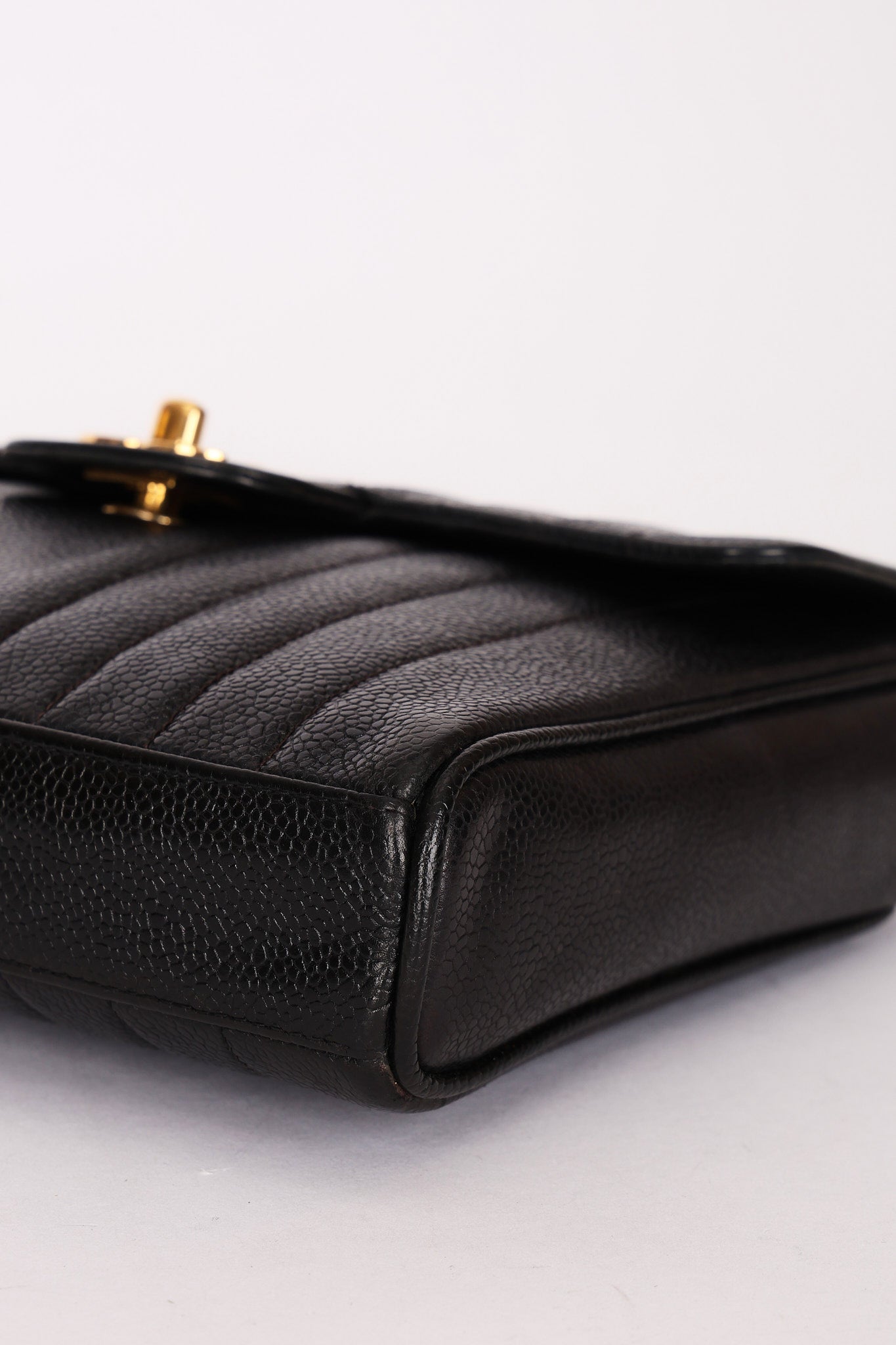 Chanel Vertical Single Flap Black Caviar 24K GP