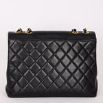 Chanel Maxi CC Timeless Single Flap Black Lambskin 24K GP