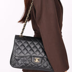 Chanel Maxi Classic Double Flap Black Caviar GHW