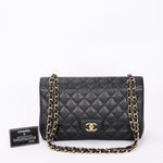 Chanel Maxi Classic Double Flap Black Caviar GHW