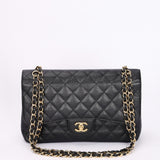 Chanel Maxi Classic Double Flap Black Caviar GHW
