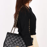 Chanel Jumbo Classic Single Flap Black Caviar 24K GP