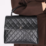 Chanel Kelly Turnlock Top Handle Bag Black Caviar SHW
