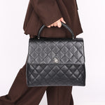 Chanel Kelly Turnlock Top Handle Bag Black Caviar SHW