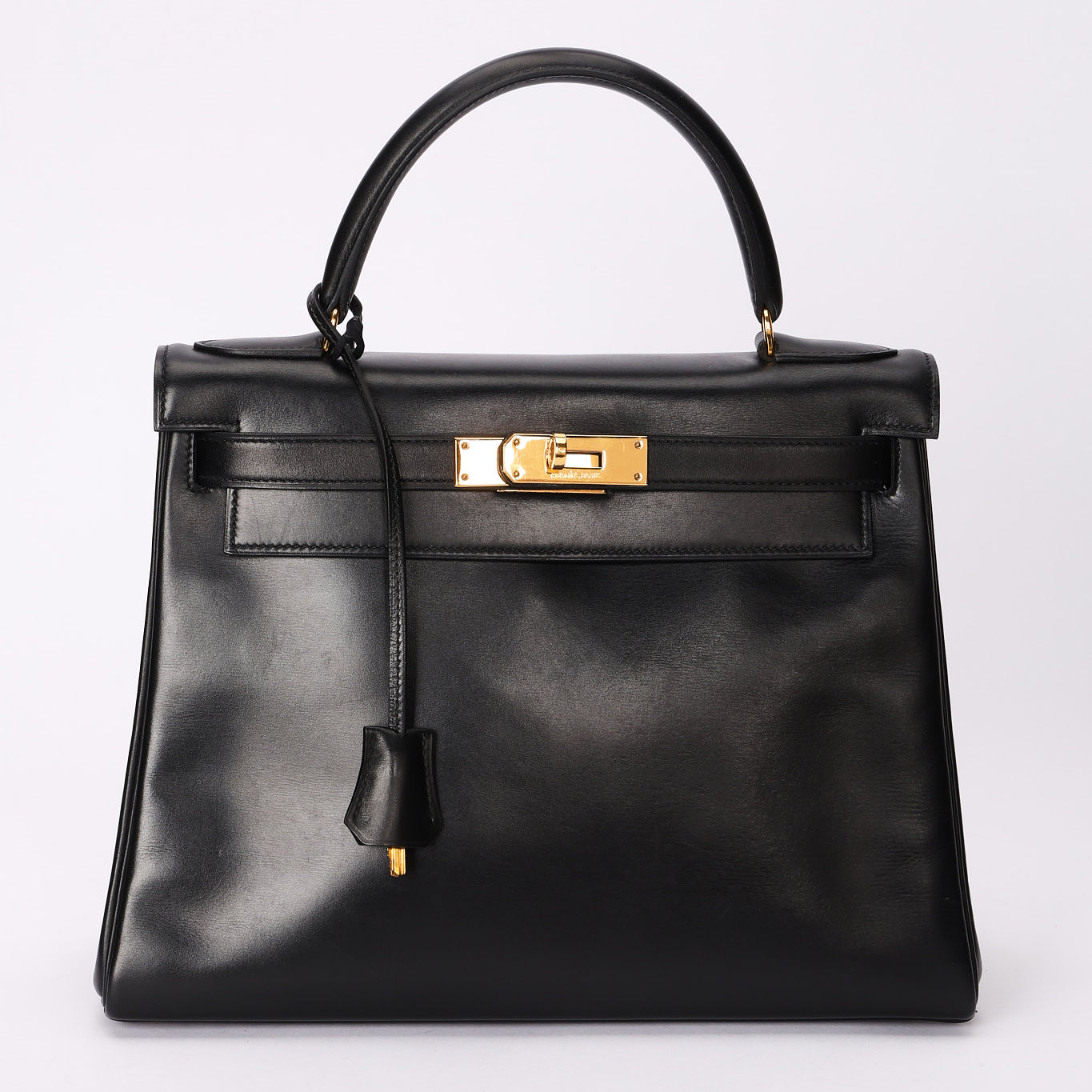 Hermès Kelly 28 Noir Box Retourne 1977 GHW