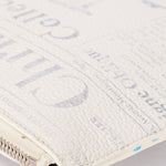 Christian Dior x Daniel Arsham Newspaper Wristlet