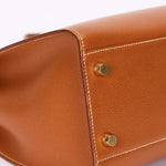 Hermès Kelly Sport MM Gold (leather) GHW