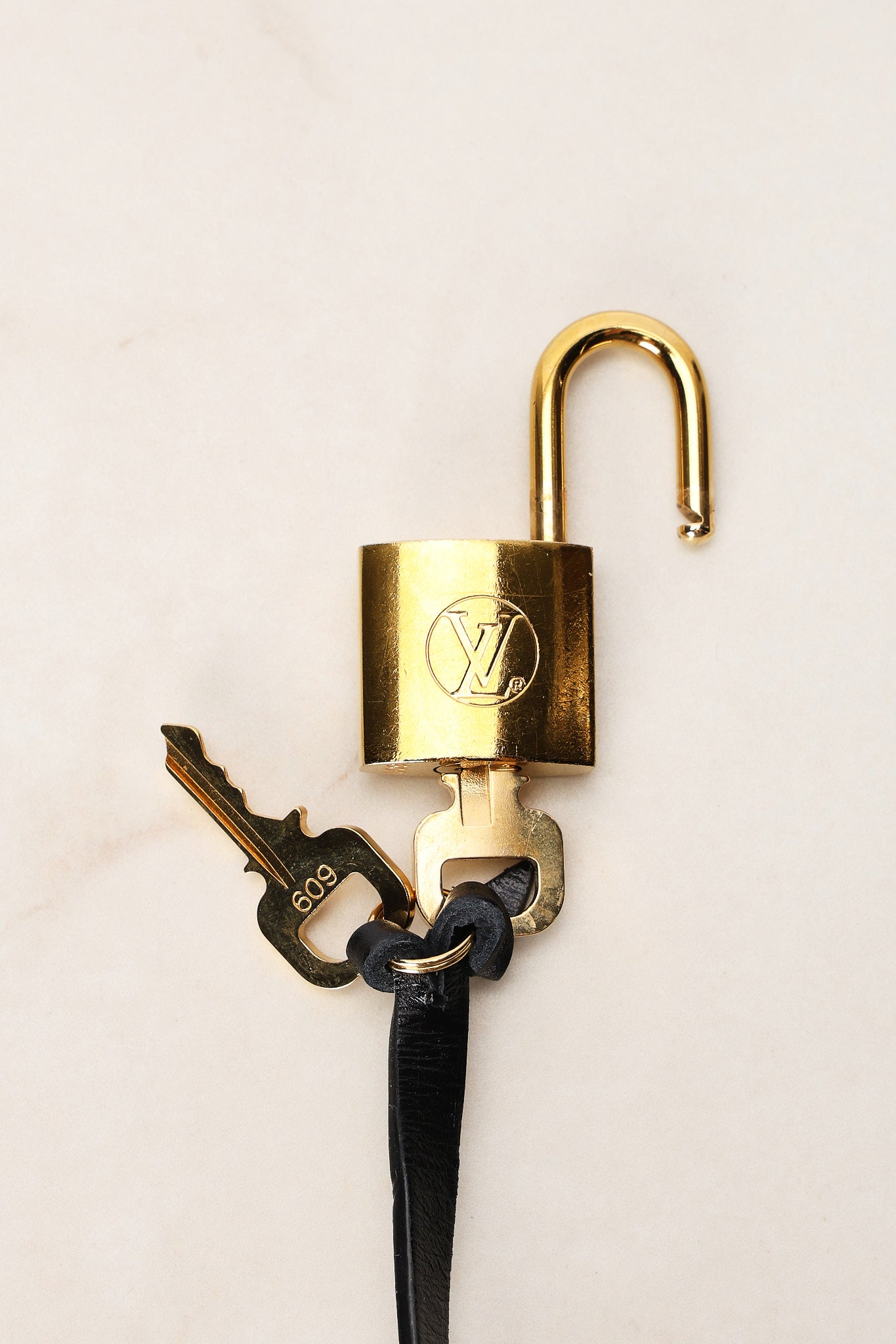 Louis Vuitton Leather Lock and Key