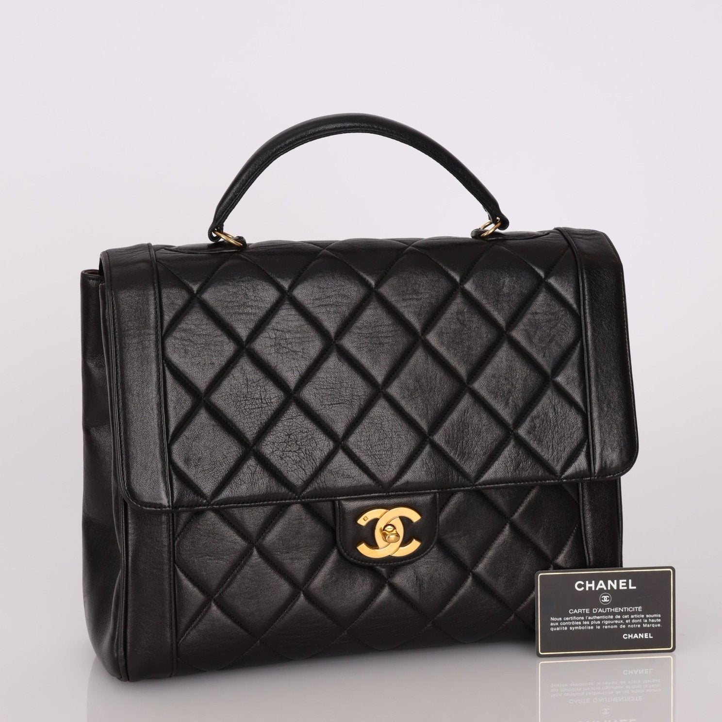 Chanel 1994 Lambskin Turnlock Top Handle Kelly - FashioNica