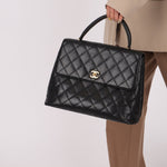 Chanel 2000 Caviar Kelly Top Handle - FashioNica