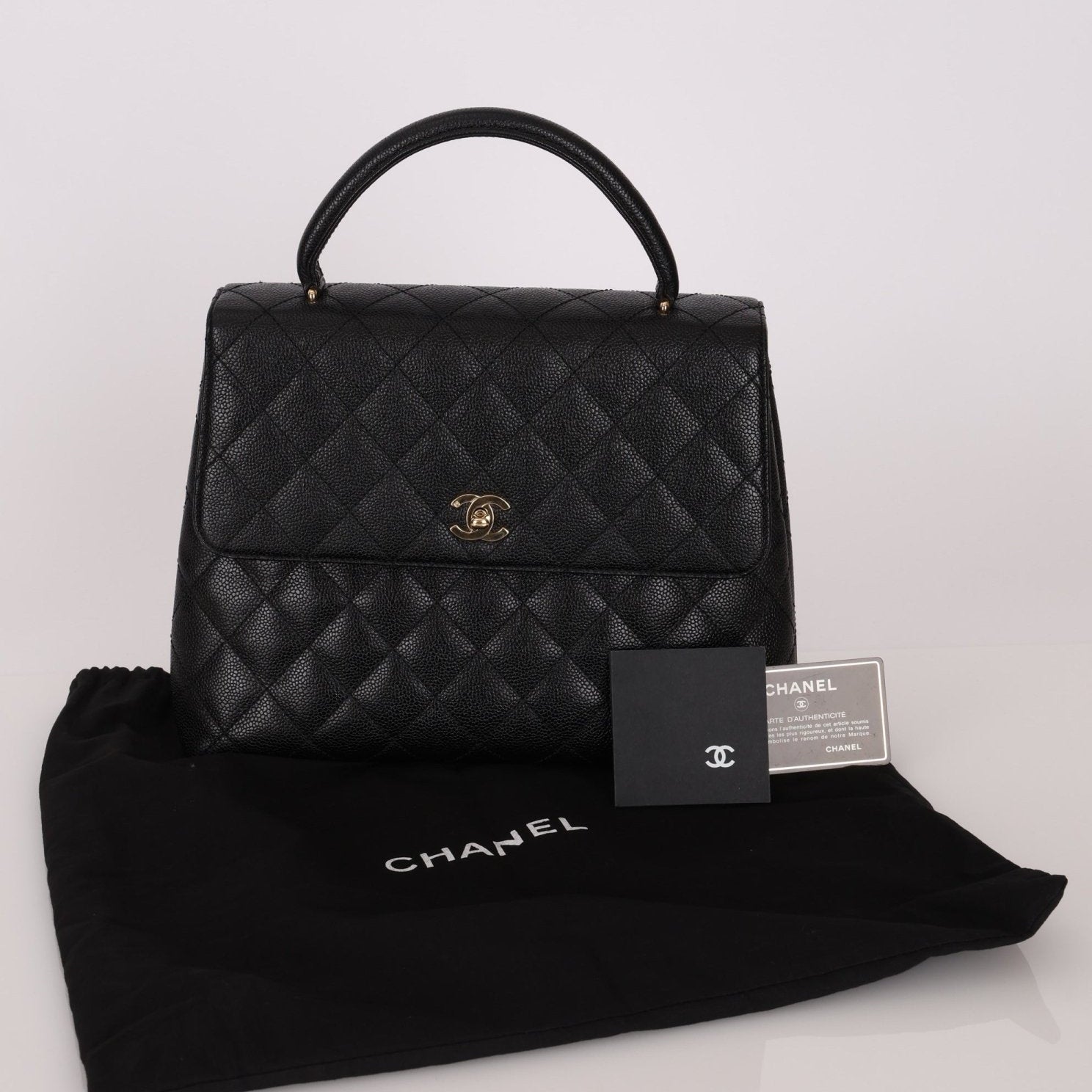 Chanel 2000 Caviar Kelly Top Handle - FashioNica