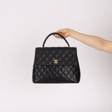Chanel 2001 Caviar Kelly Turnlock Top Handle 24K GP - FashioNica