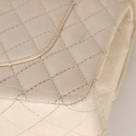 Chanel 2014 Iridescent Ivory Caviar Medium Classic Double Flap - FashioNica