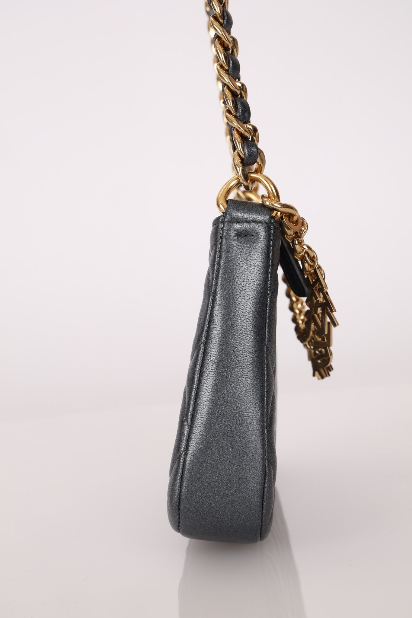 Chanel 2021 Metallic Logo Charms Quilted Pochette - FashioNica