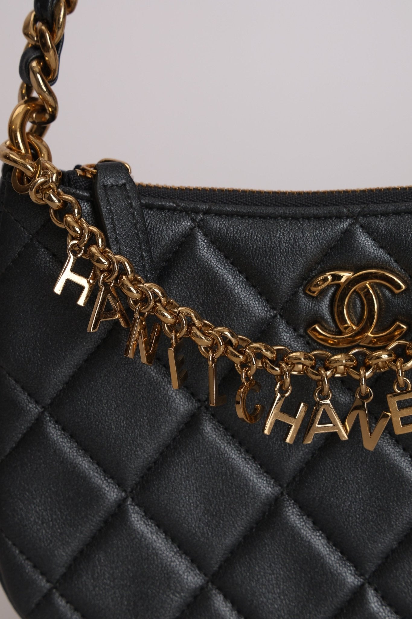 Chanel 2021 Metallic Logo Charms Quilted Pochette - FashioNica