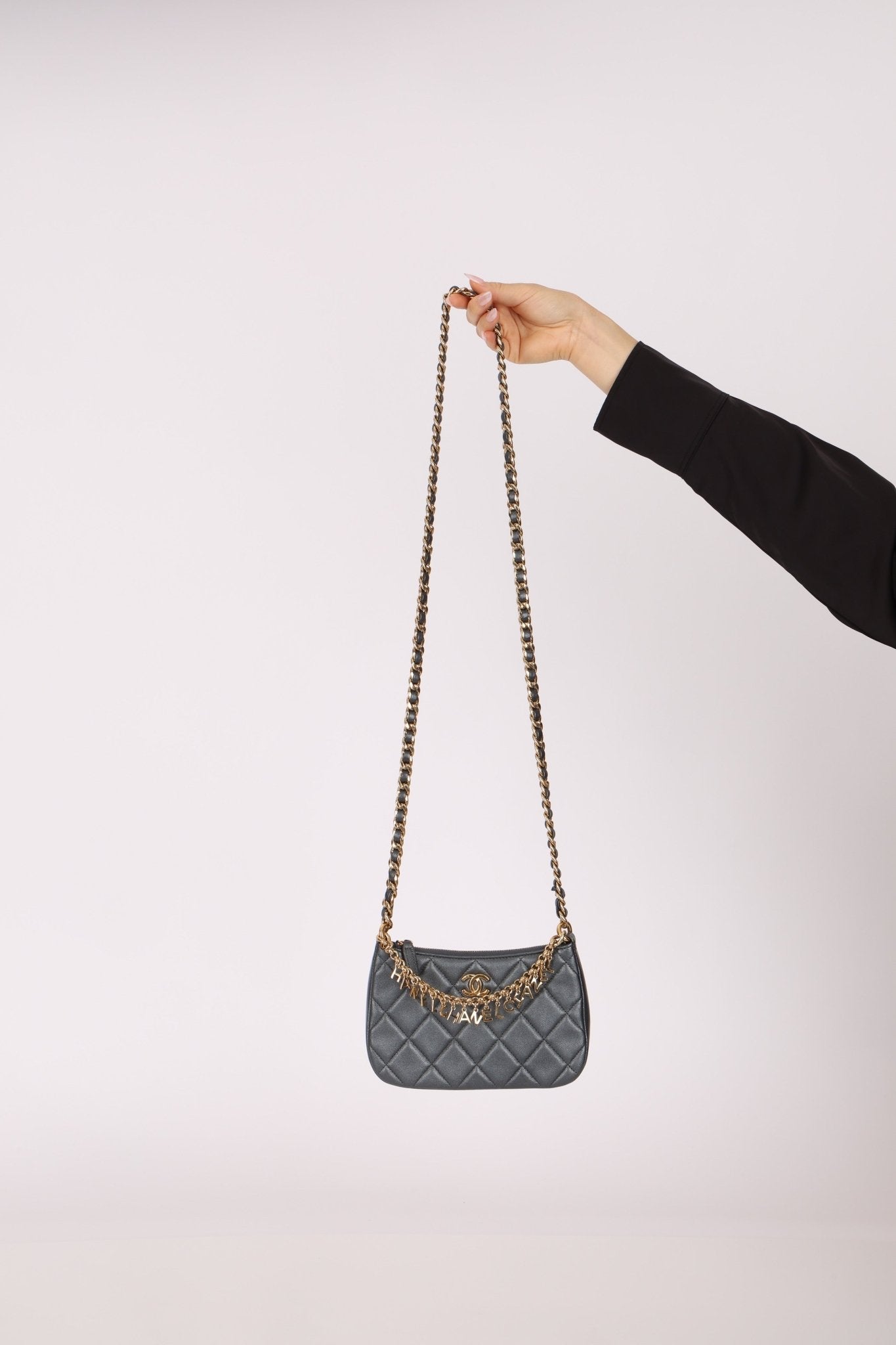 Chanel 2021 Metallic Logo Charms Quilted Pochette - FashioNica