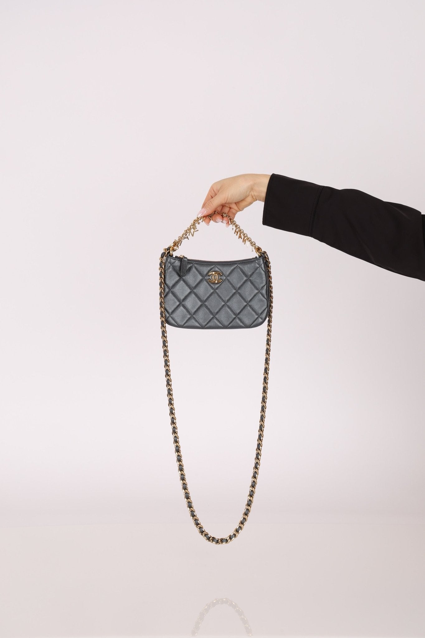 Chanel 2021 Metallic Logo Charms Quilted Pochette - FashioNica