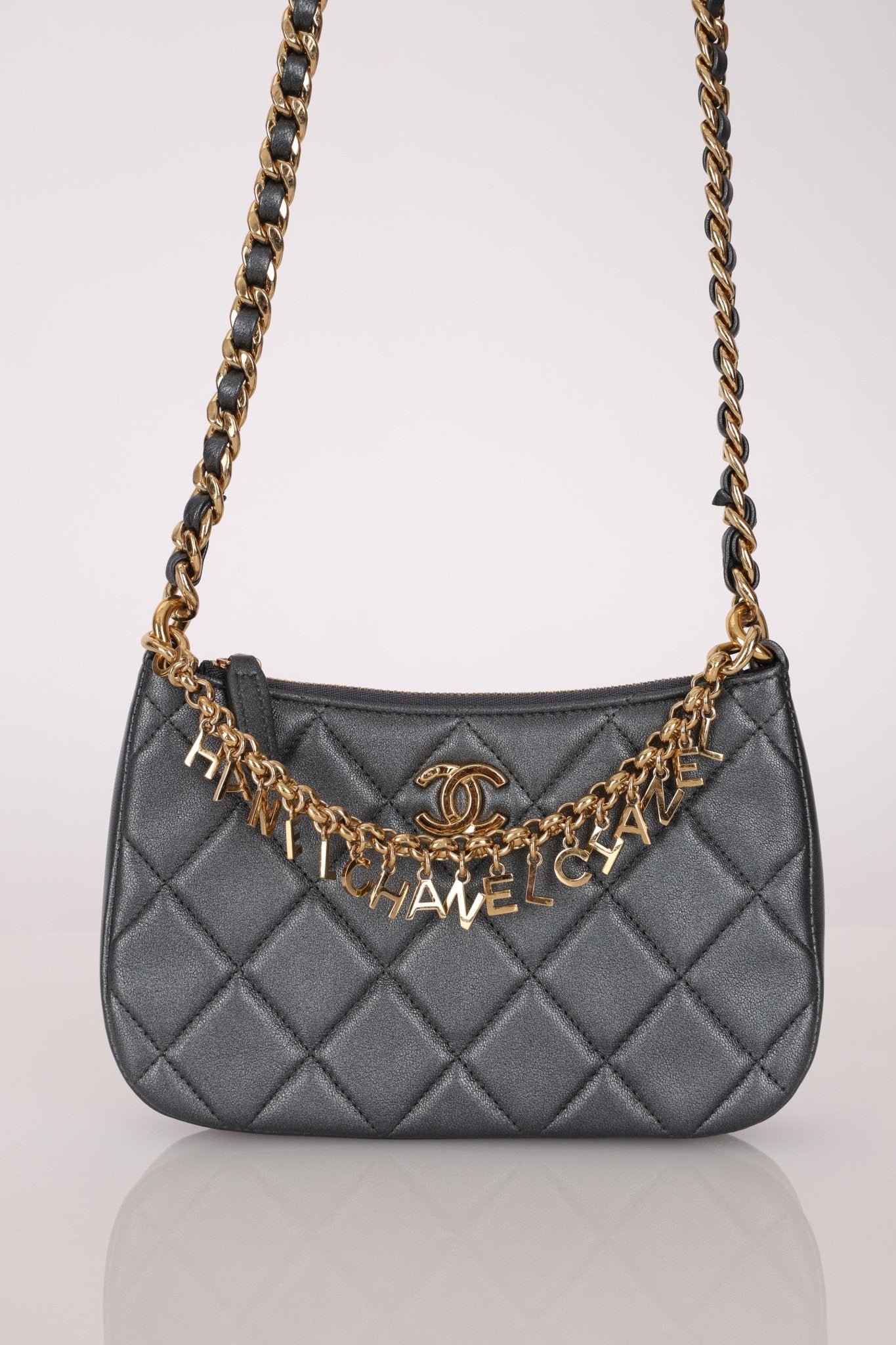 Chanel 2021 Metallic Logo Charms Quilted Pochette - FashioNica
