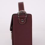 Fendi Leather Maroon Zucca Soft Trunk Baguette - FashioNica