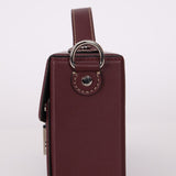 Fendi Leather Maroon Zucca Soft Trunk Baguette - FashioNica