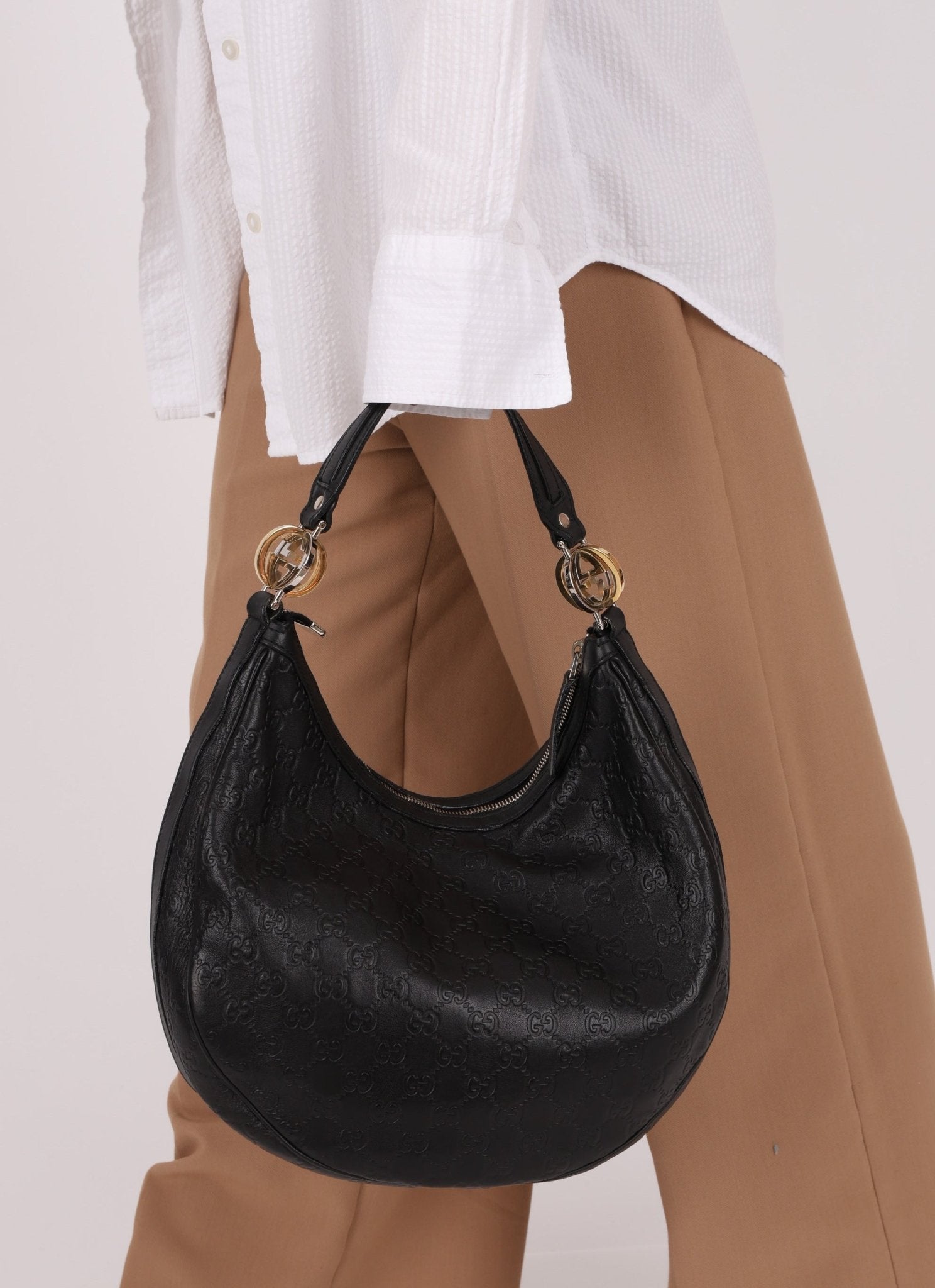 Gucci Monogram Embossed Leather Hobo - FashioNica
