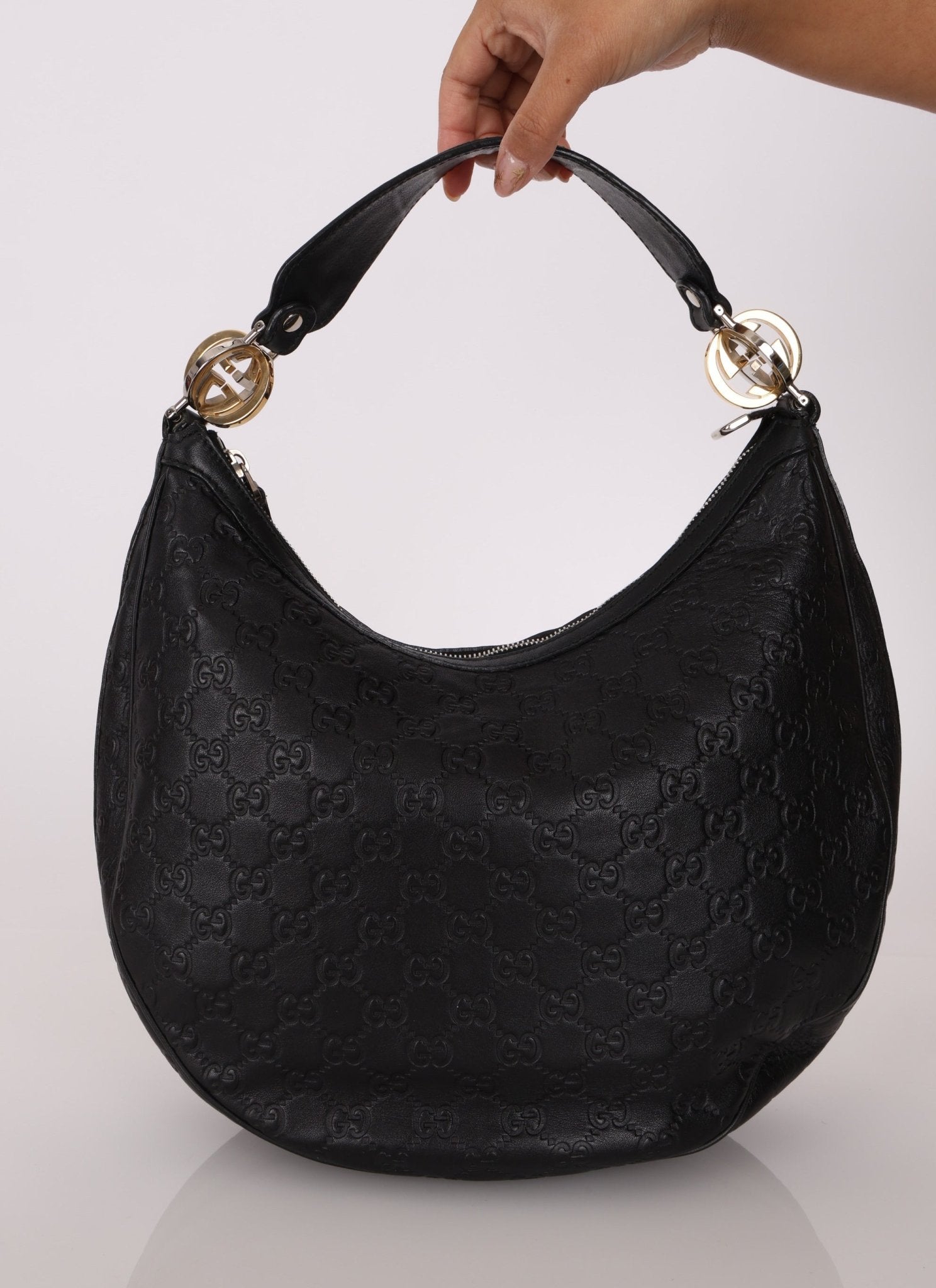 Gucci Monogram Embossed Leather Hobo - FashioNica