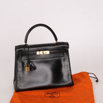 Hermès 1964 Noir Box Calf Retourne Kelly 28 - FashioNica