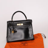 Hermès 1964 Noir Box Calf Retourne Kelly 28 - FashioNica