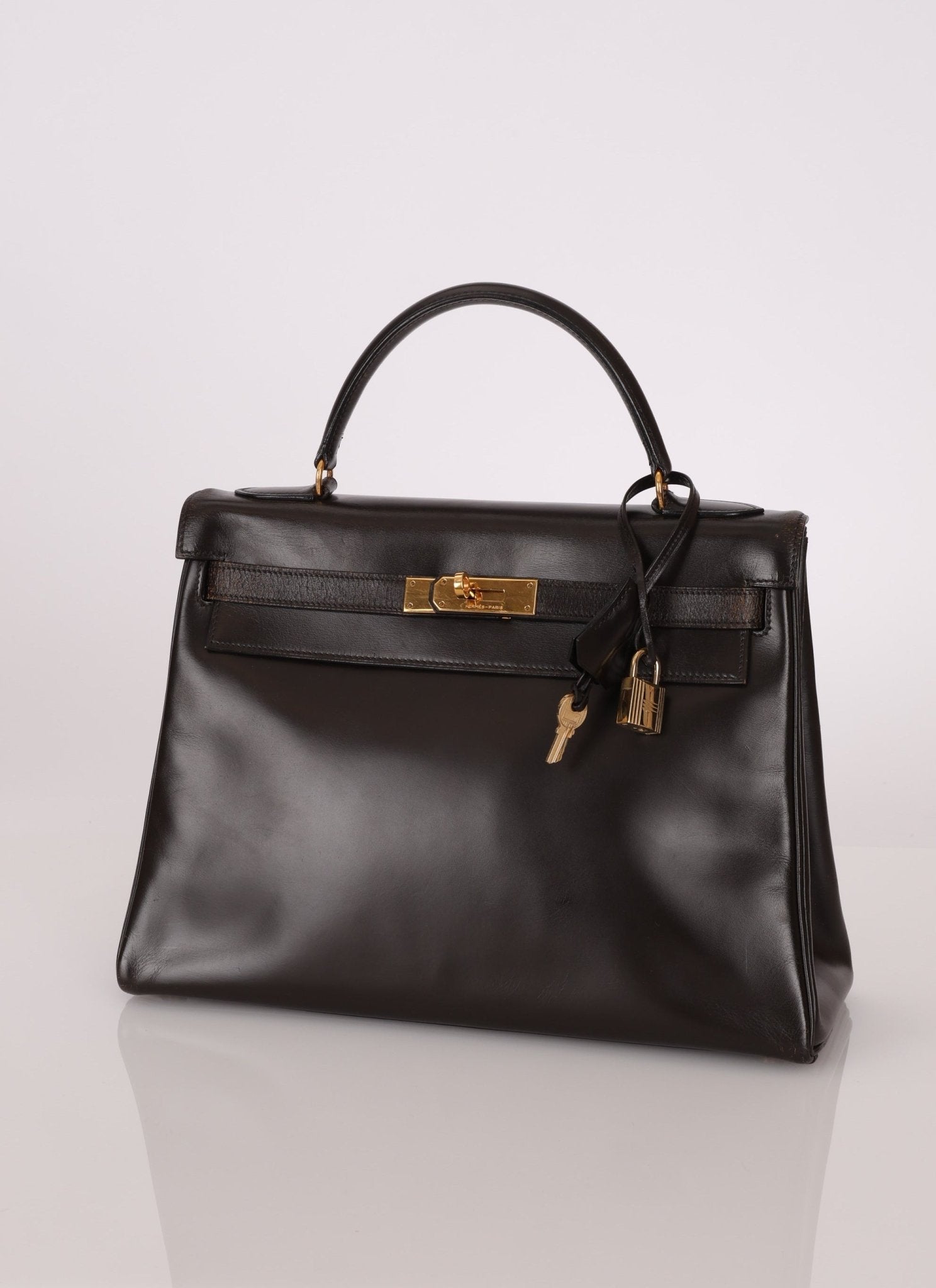 Hermès 1979 Chocolate Box Retourne Kelly 32 with Strap - FashioNica