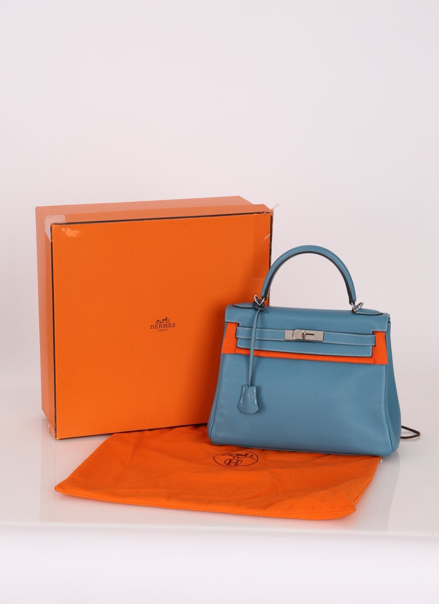 Hermès 2006 Bleu Jean Swift Retourne Kelly 28 PHW - FashioNica