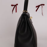 Hermès 2009 Noir Swift Kelly 32 GHW - FashioNica