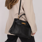 Hermès 2009 Noir Swift Kelly 32 GHW - FashioNica