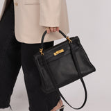 Hermès 2009 Noir Swift Kelly 32 GHW - FashioNica