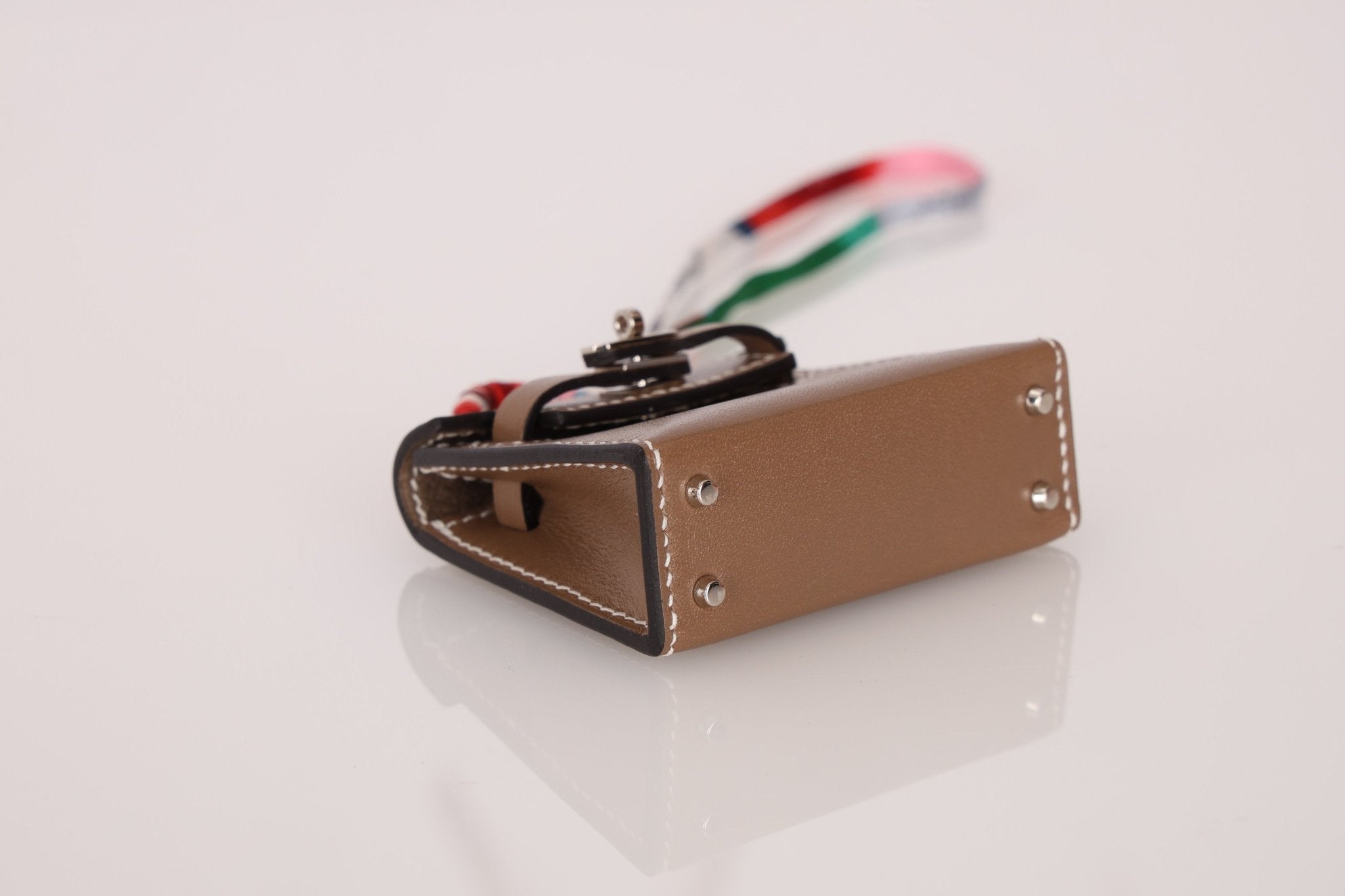 Hermès 2020 Etoupe Tadelakt Micro Kelly Twilly Bag Charm - FashioNica