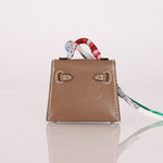 Hermès 2020 Etoupe Tadelakt Micro Kelly Twilly Bag Charm - FashioNica