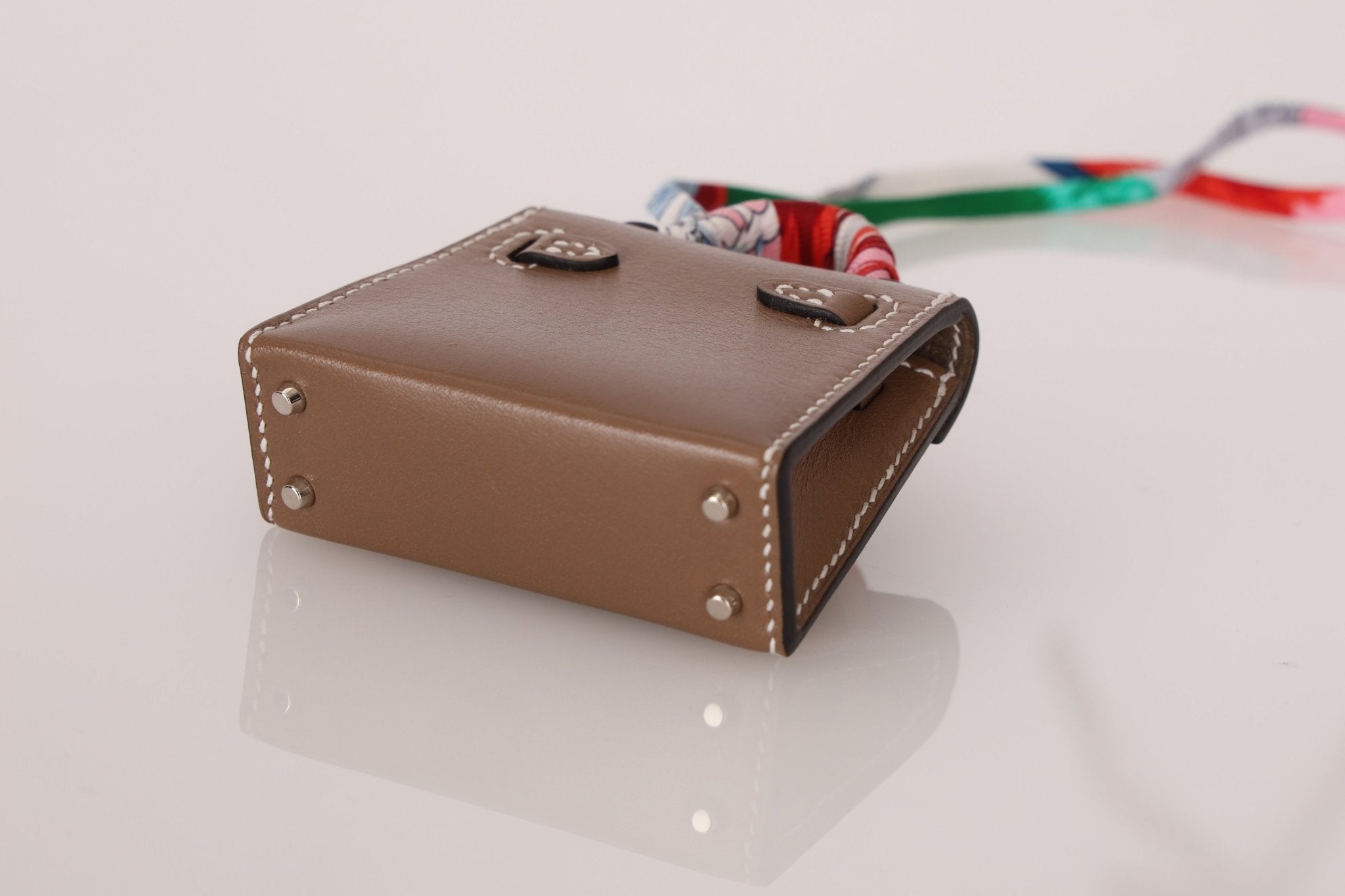 Hermès 2020 Etoupe Tadelakt Micro Kelly Twilly Bag Charm - FashioNica