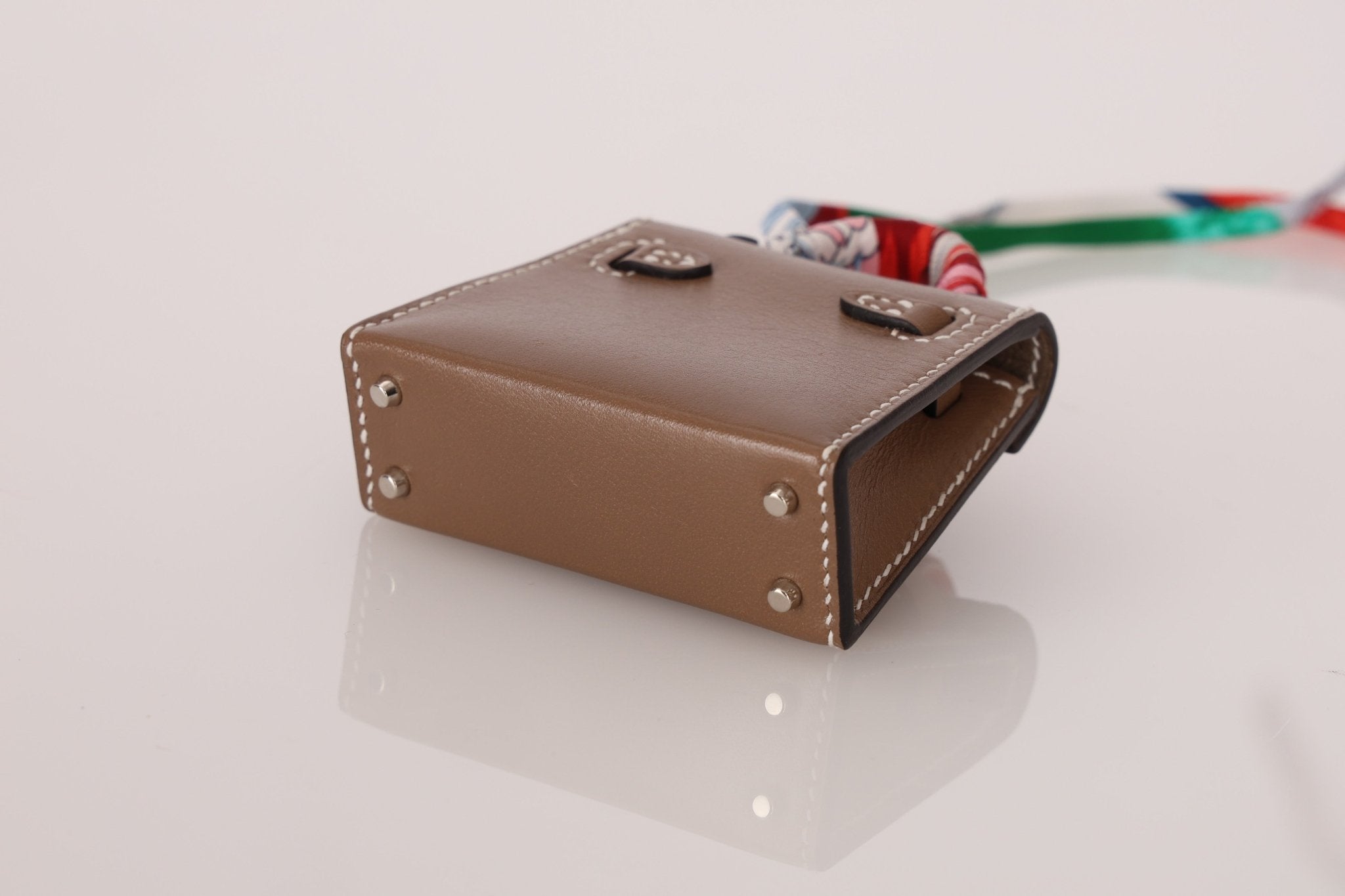 Hermès 2020 Etoupe Tadelakt Micro Kelly Twilly Bag Charm - FashioNica